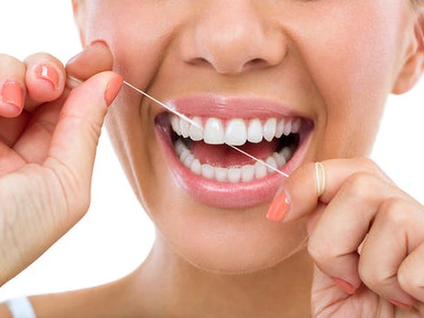 flossing teeth flossing teeth