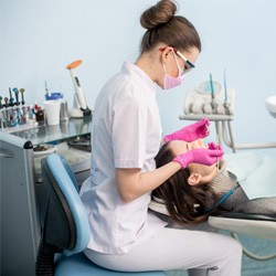 Woman getting a dental cleaning