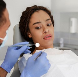 Woman afraid in the dental chair